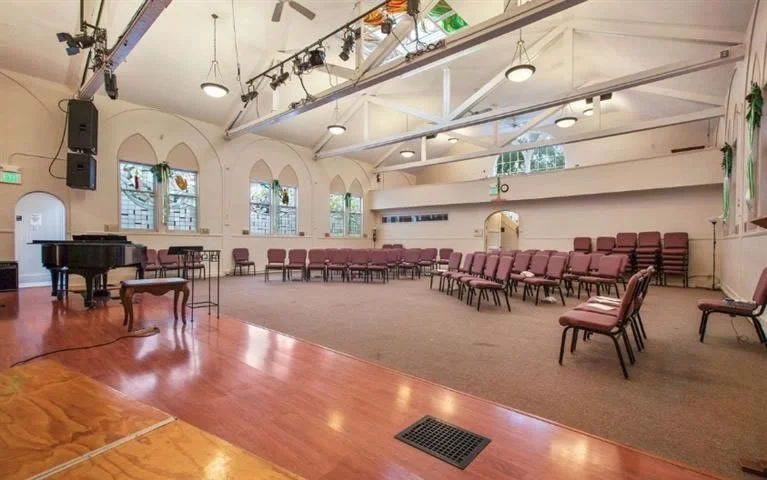  150 Eureka Street — post MCC San Francisco. The stained glass skylight is visible in the center of the ceiling. 