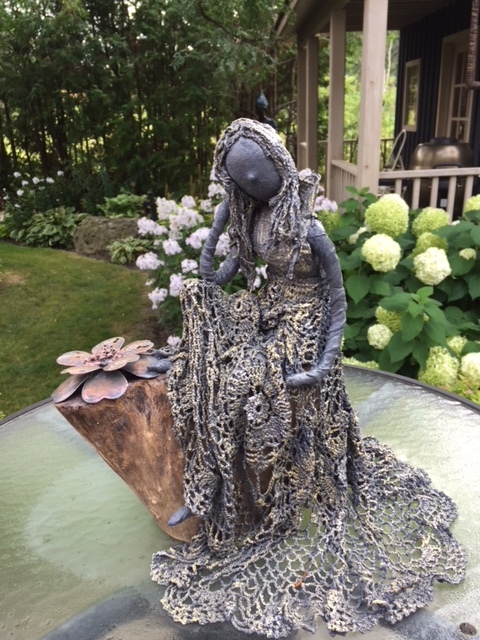 Female seated with log.jpeg
