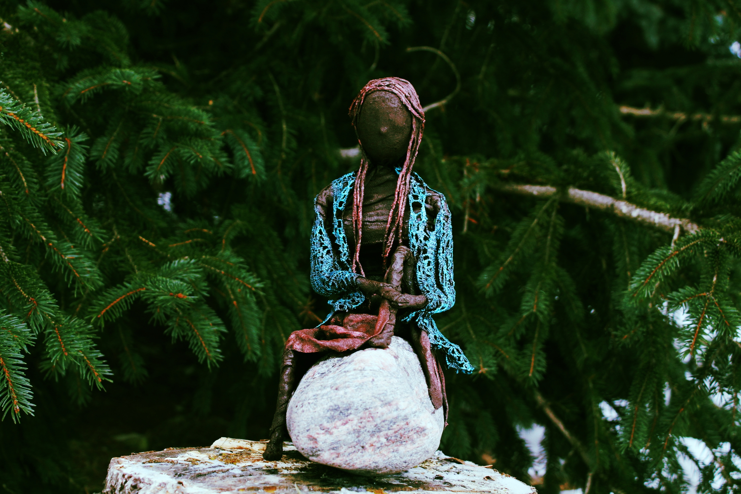 seated figure on rock.JPG