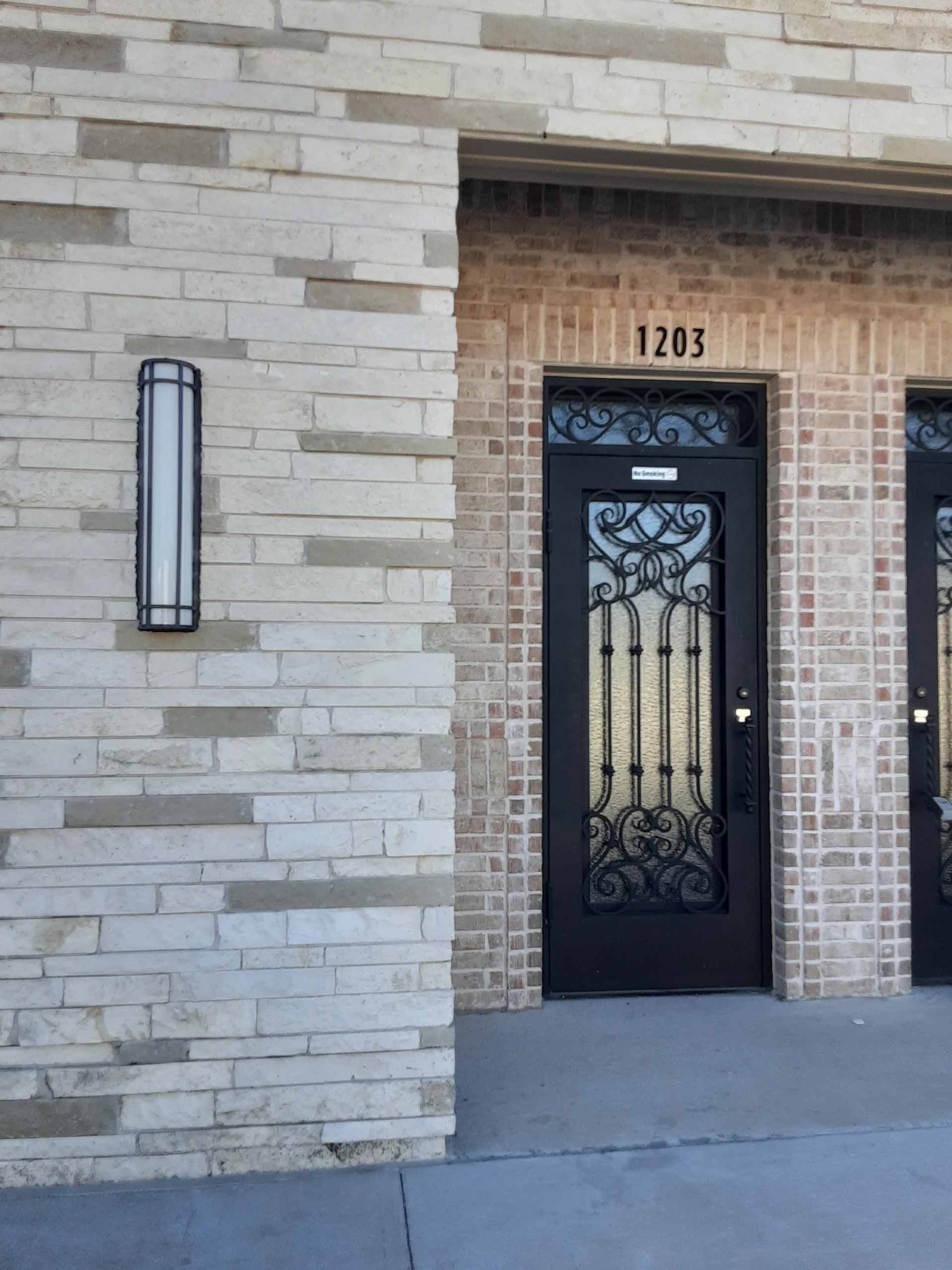 Door to the lobby of My Rooted Soul Counseling Suite 1203