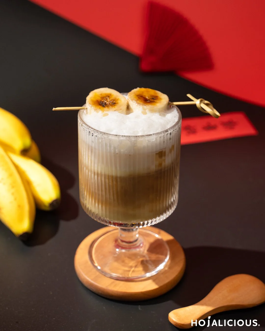 Classic banana latte made with banana milk, espresso, and milk foam, a dessert-style banana coffee drink