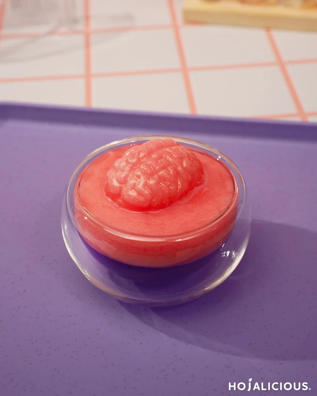 Layered strawberry pudding with a brain-shaped jelly topping, showcasing kawaii mood expressions