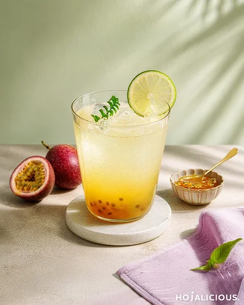 passion fruit yogurt soda with sparkling layers and lemon garnish