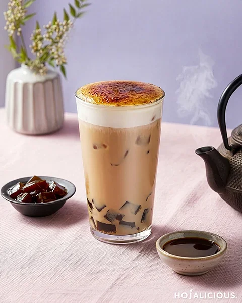Brown sugar roasted oolong milk tea with jelly and cream foam topping
