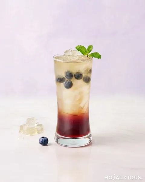 Blueberry Aloe Fruit Tea made with Four Seasons Tea, Blueberry Flavor Syrup, Blueberry Pulp, Aloe Vera, and ice.