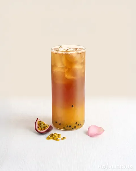 Passion Fruit Rose Tea made with Passion Fruit Jam, Rose Ceylon Tea, and Cane Sugar Syrup, featuring refreshing tropical fruit notes, elegant floral aroma, and a smooth black tea finish.
