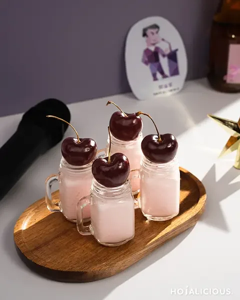 ENTP Cherry Muse Shot, strawberry syrup drink with fresh cherry garnish