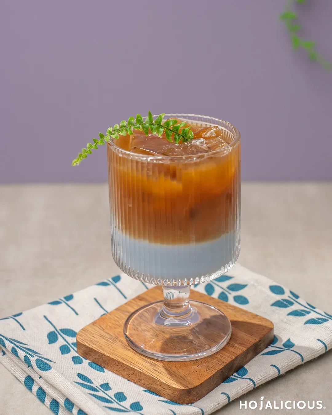 Layered taro milk tea and espresso with a gradient visual effect