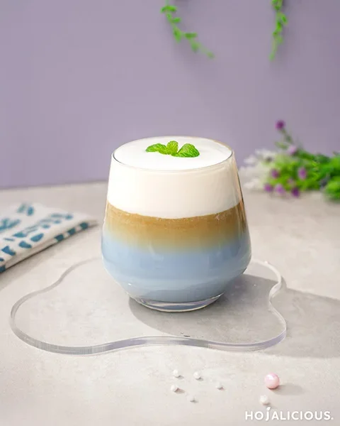 Layered taro coffee with cream foam and espresso