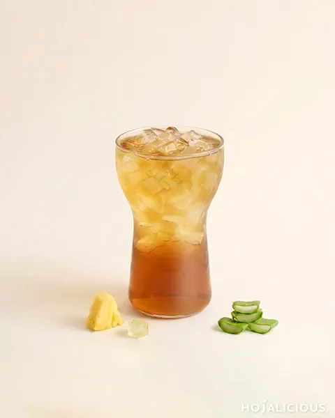Pineapple Winter Melon Oolong Tea made with Dong Ding Oolong Tea, Pineapple Jam, Winter Melon Syrup, and Aloe Vera, creating a refreshing fruit tea with roasted tea notes, mellow sweetness, and crisp texture.