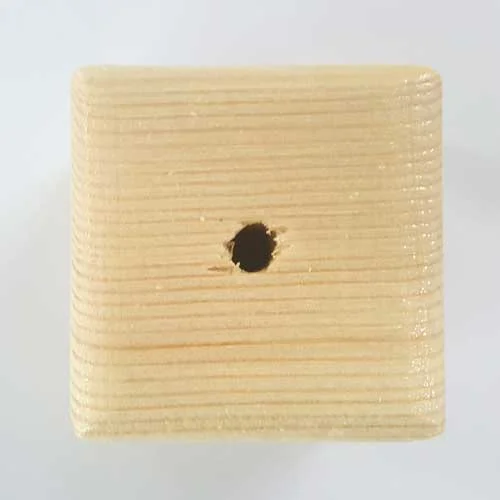 The middle hole is wide enough to fit any size of nail.