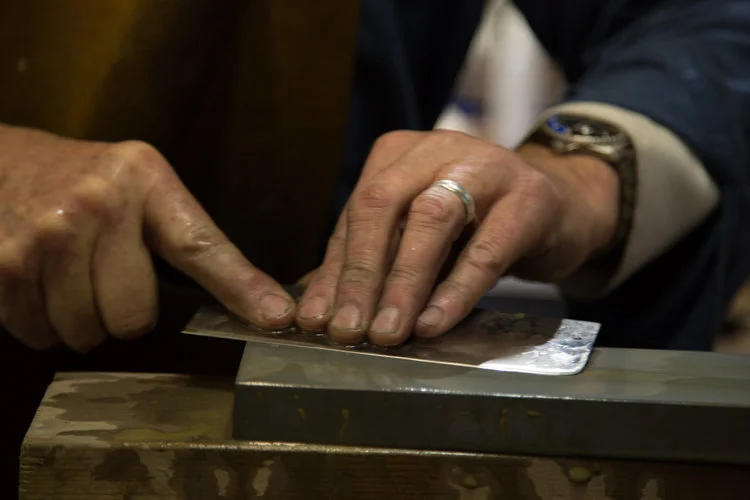 Grinding the final bevels and edges starting with a 400 grit stone