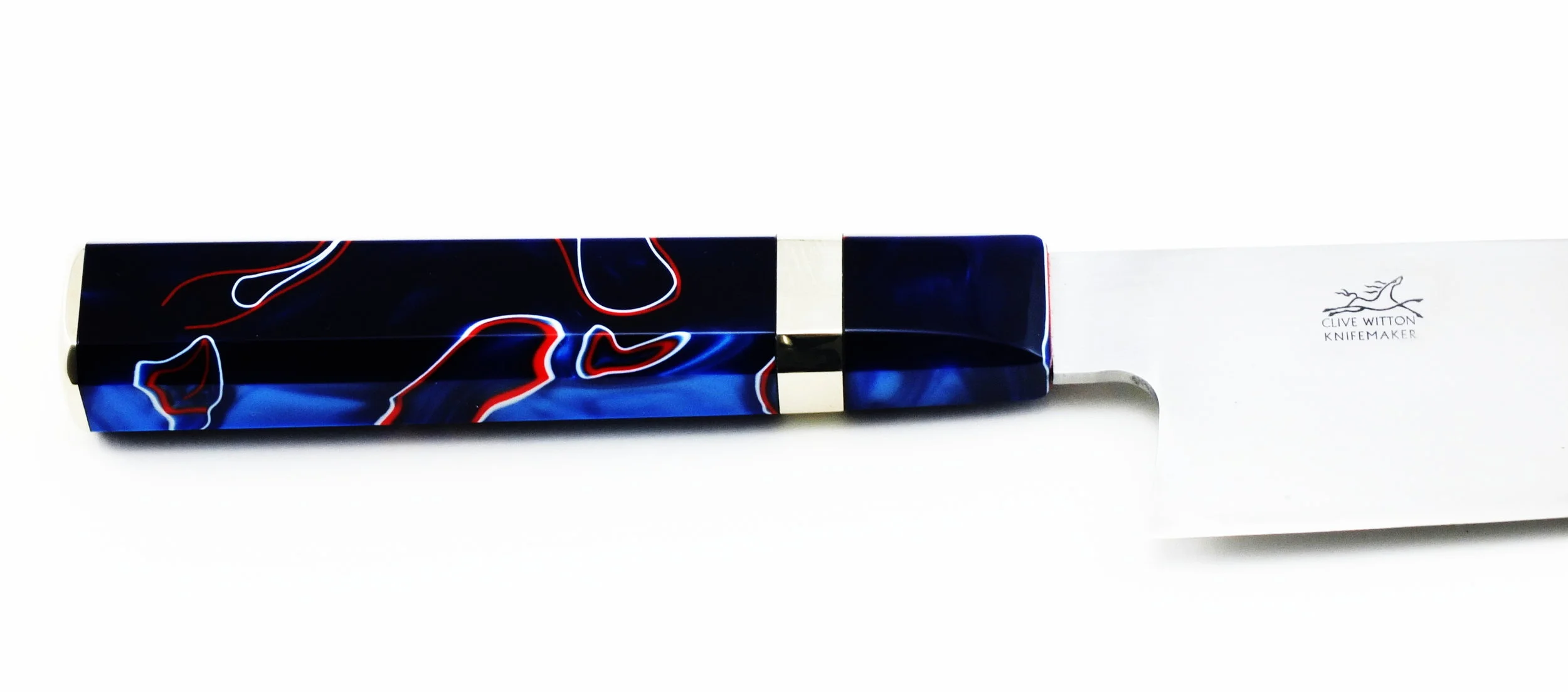 10 Inch Cook's KnifeA large cook's knife in Sandvik 14c28n, heat treated to 62 Rockwell C. Kirinite Patriot handle with nickel silver fittings.