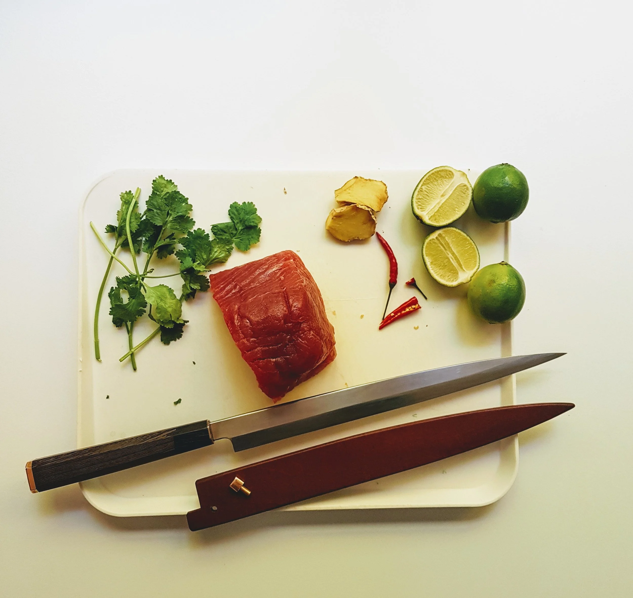 300mm Yanagiba300mm Yanagiba in D2 steel with a Wenge and Bronze handle and a saya in Red Gum Burl