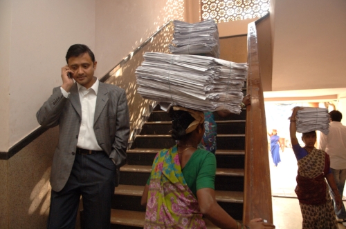 Gopal Krishnan, Mobile2Win's co-founder, walking down the stairs from M2W's offices based in an old printing press building on the Todi estate in Mumbai. GK, as he's called, thinks that the real technological revolution in India will happen not via the PC, but via the mobile phone. 