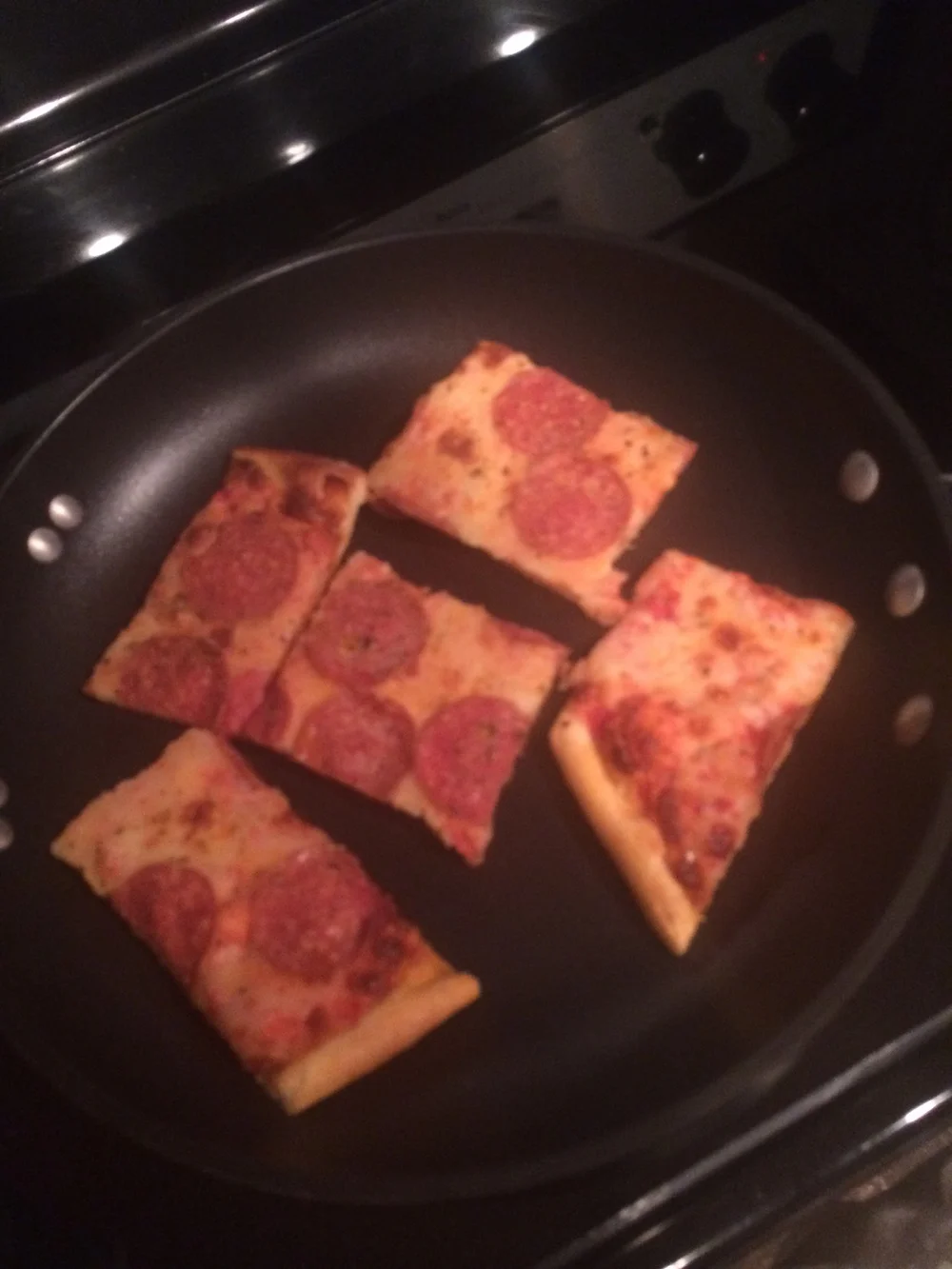 P.S.: Heating up leftover pizza in a frying pan is the best way to ensure a crispy, non-soggy crust. 