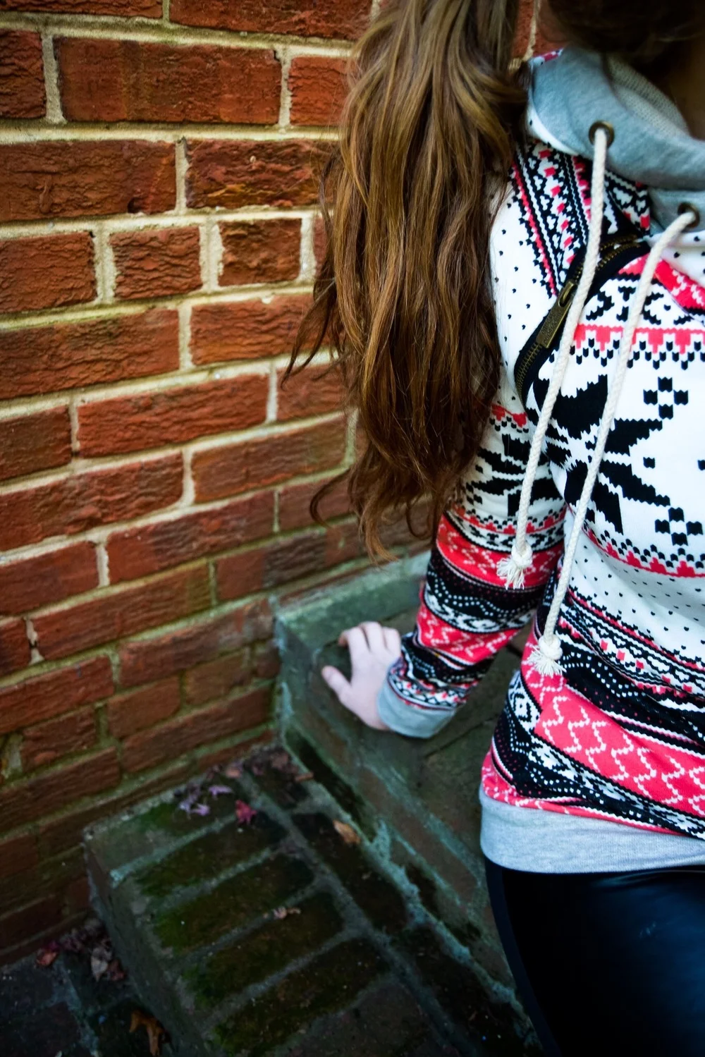 Living in this wintery printed double hoodie this winter. (Mindy Mae's Market.)