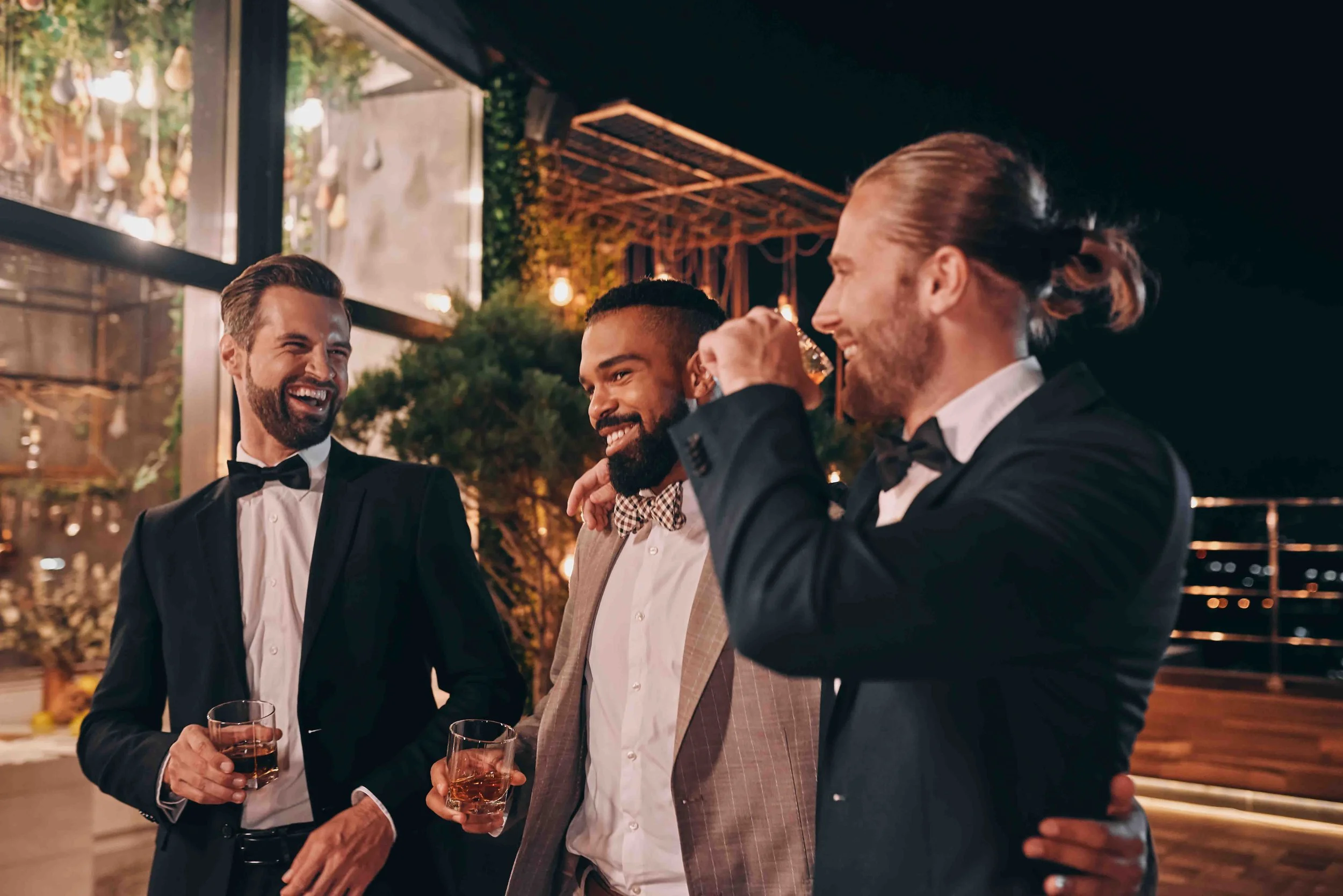 Groom and best man at a wedding reception