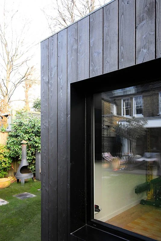 Charred timber garden building