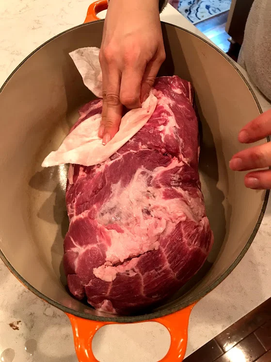 Look at how I pat dry the pork. I don't want that mess on my counter, m'kay?