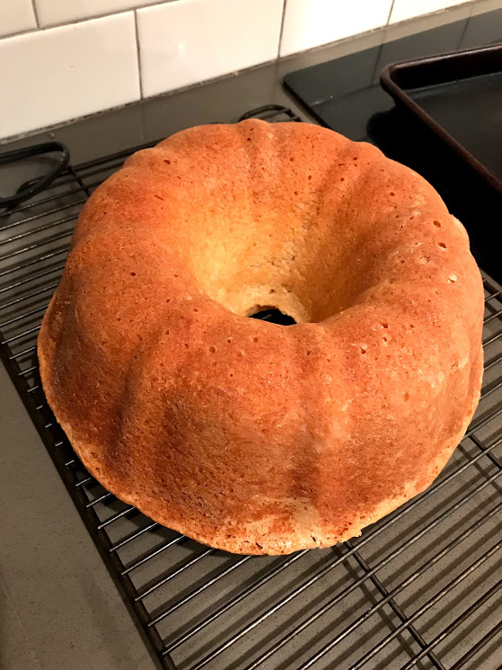 Let it hang out in the pan for 20ish minutes and then turn it out carefully onto a cooling rack, where it will hang out for a couple days. I turn it out by holding the cooling rack against the top of the pan and flipping it over, maybe with a little wiggle to get that sucker out.