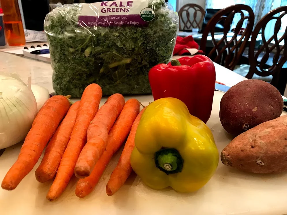 Next get all these gorgeous vegetables chopped and ready for the soup pot. I had a small white and orange sweet potato each, so I used that in place of a large sweet.