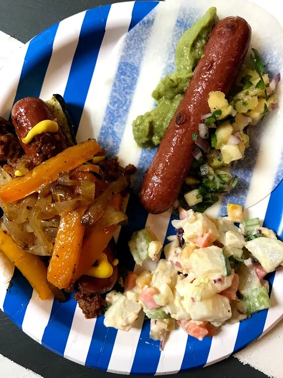 This is what my plate looked like! I used a zucchini boat "bun" topped with the chili, squeeze of yellow mustard, and finished with sauteed peppers and onions. My other one was a jicama tortilla filled with pineapple salsa and guac alongside my diggy dog.