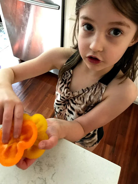 Have your kids steal the pepper butts like this little missy!