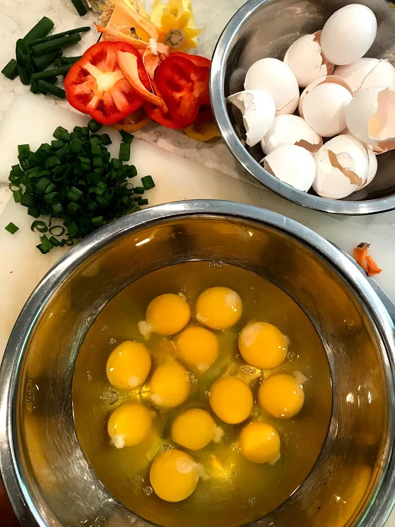 A chicken coop worth of eggs, all ready to be mixed up. I find beauty in chaos too, all those veggie scraps and eggshells...