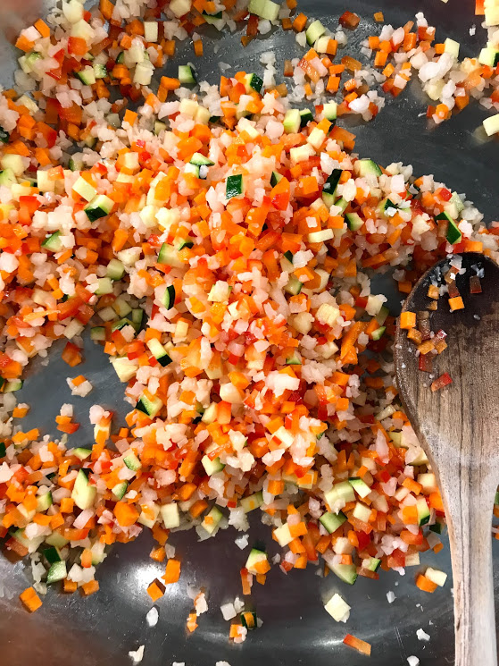 Heat up the oil and saute the veggies, excluding the kale. Season with some salt and pepper.