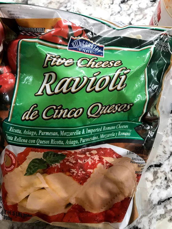 These are the raviolis I grabbed in the frozen section. If you are gluten free, there are several options at Whole Foods. If dairy-free, I would use a meat or mushroom variety. 