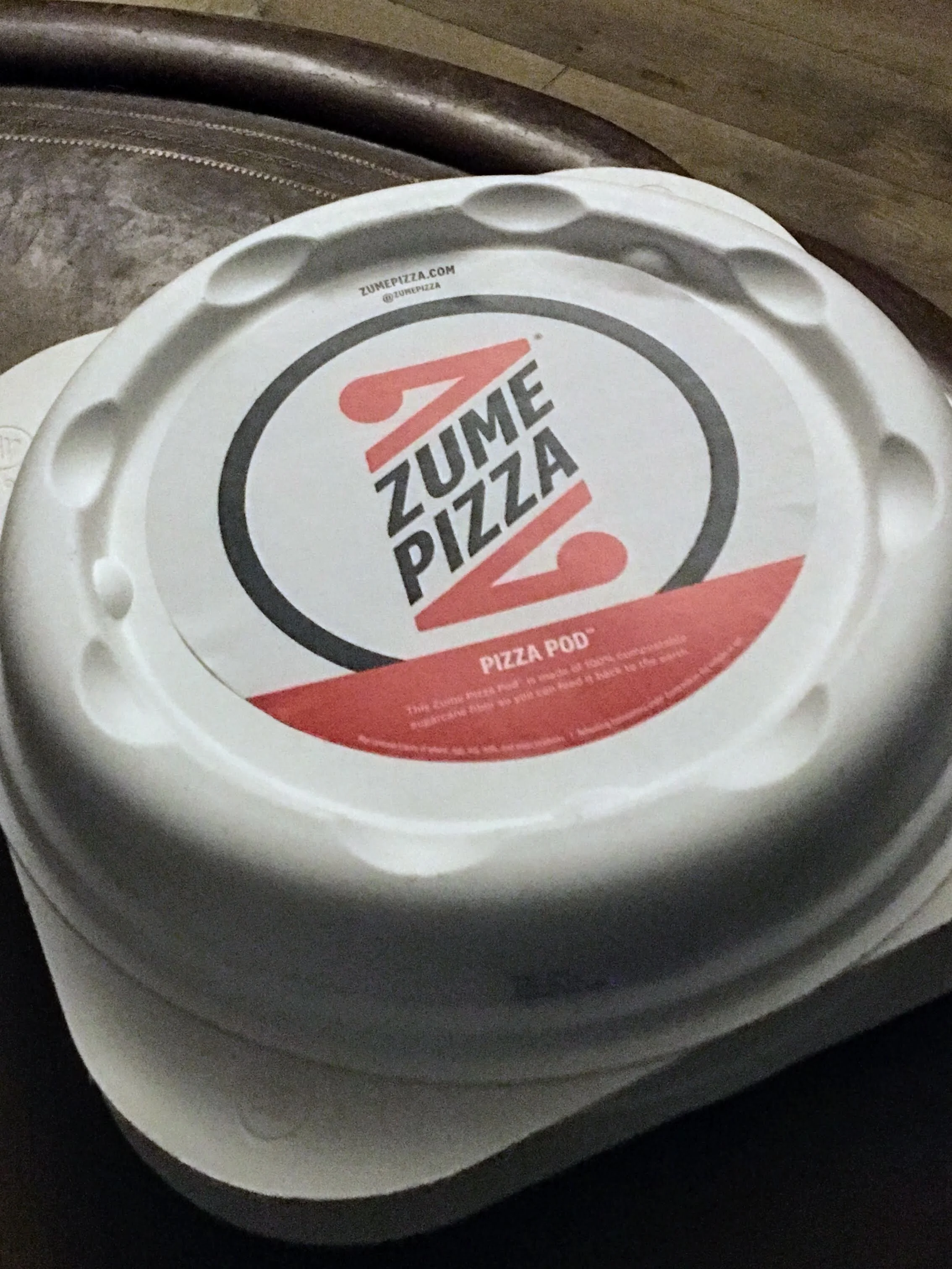 Ok, the idea was supposed to be that a truck full of ovens rolls up to your house and pulls the pizza about of the truck. What actually happened is some dude rolled in a Honda Civic and pulled out pizzas out of an insulated bag. He said the truck is parked nearby. So basically the A.I. trucks replace franchise locations. 