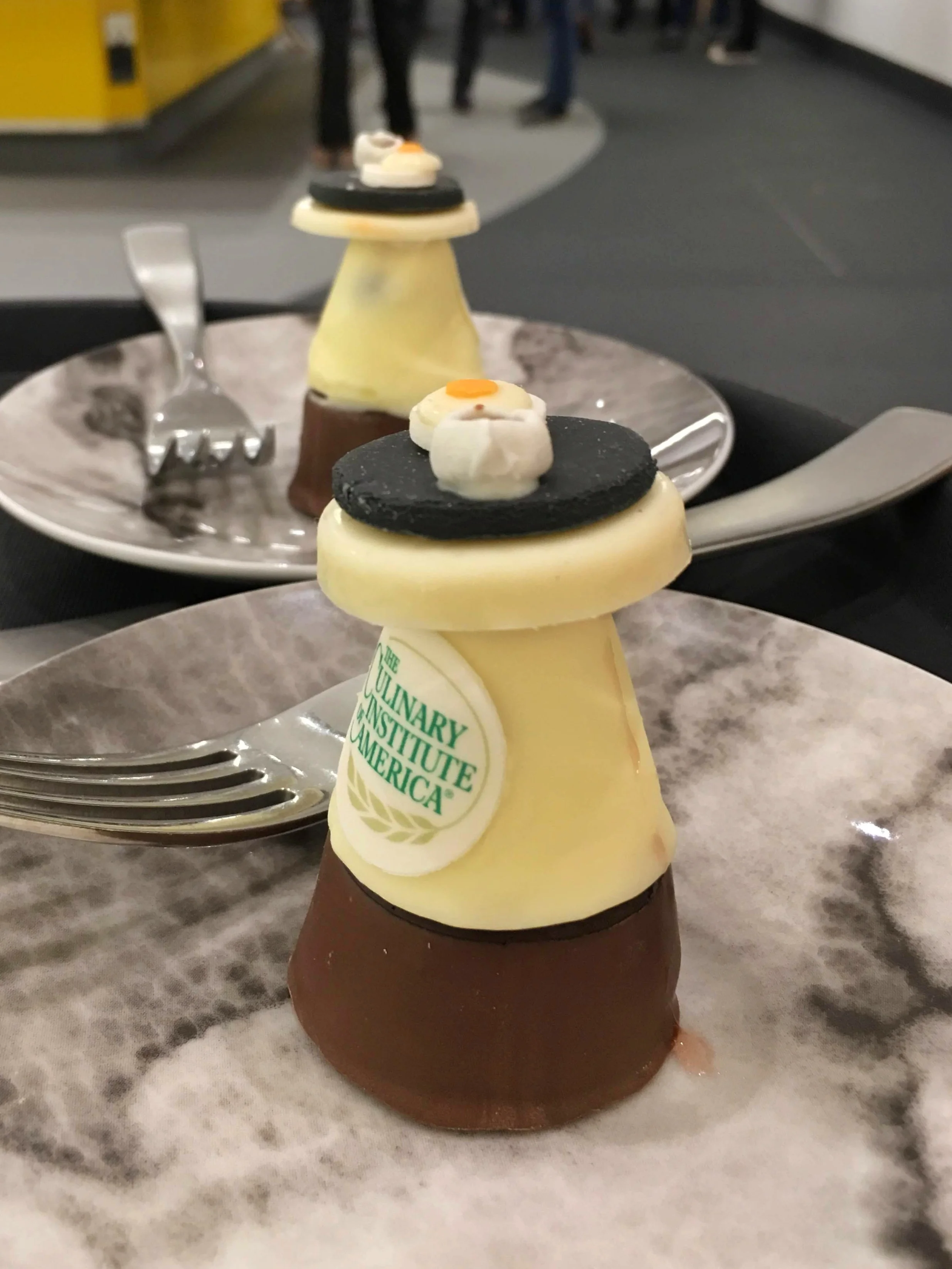 The desserts were, in fact, chocolate waiter robots, with dark chocolate on the bottom and white chocolate on the top with a very dark chocolate “tray” on top.