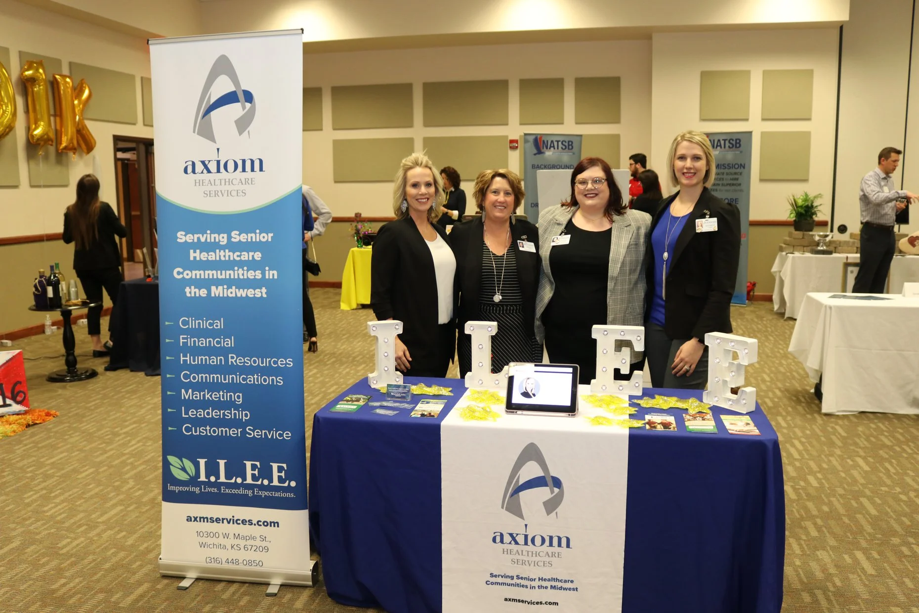 Axiom employees: Stephanie Wiens, Brenda Kruse, Dayna Hoock, and Madison Osoba.