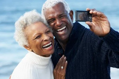 A happy senior couple taking a selfie together