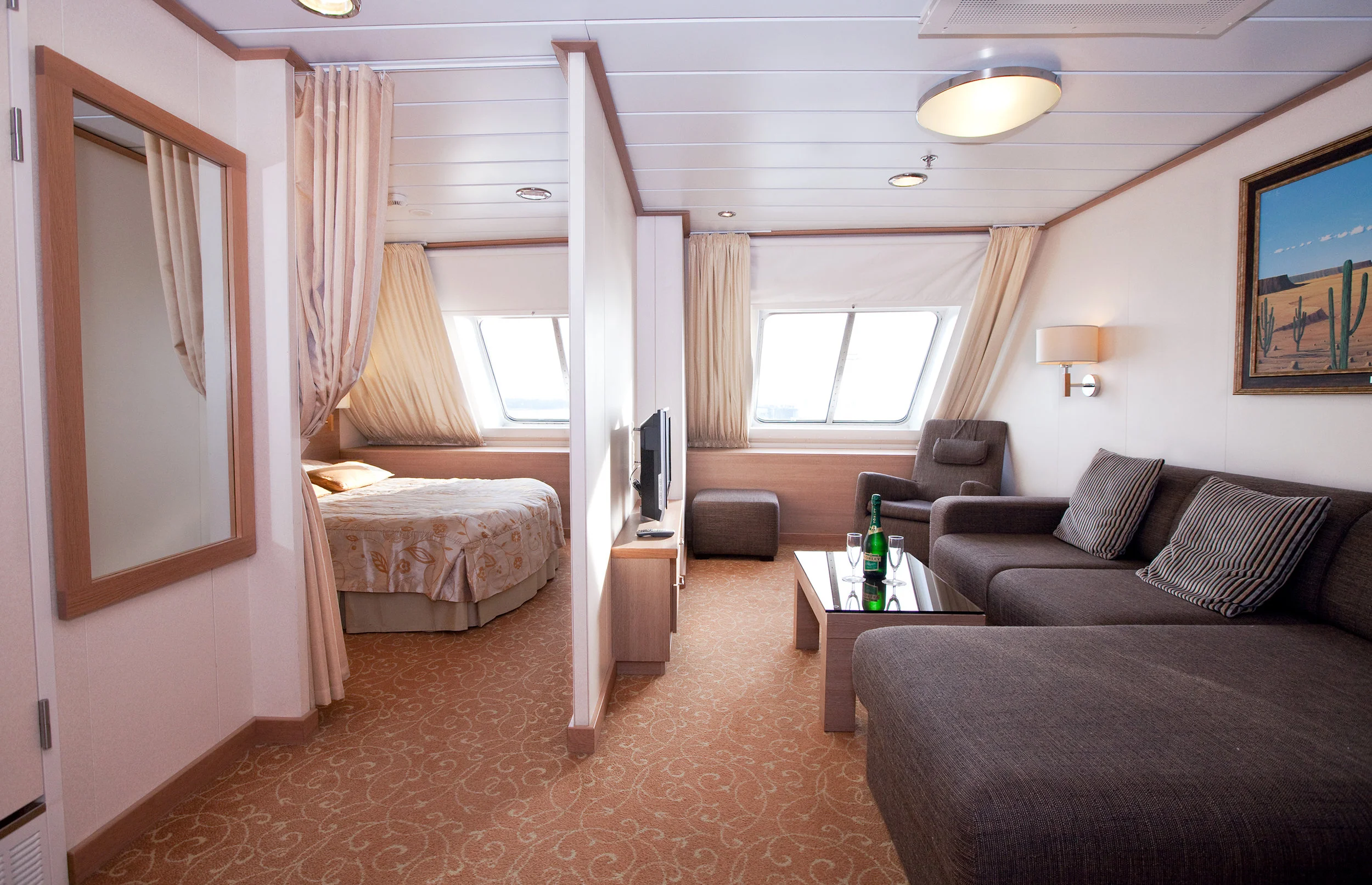 Suite –Class (top deck, double bed, a window) 120€/person for 2 passengers