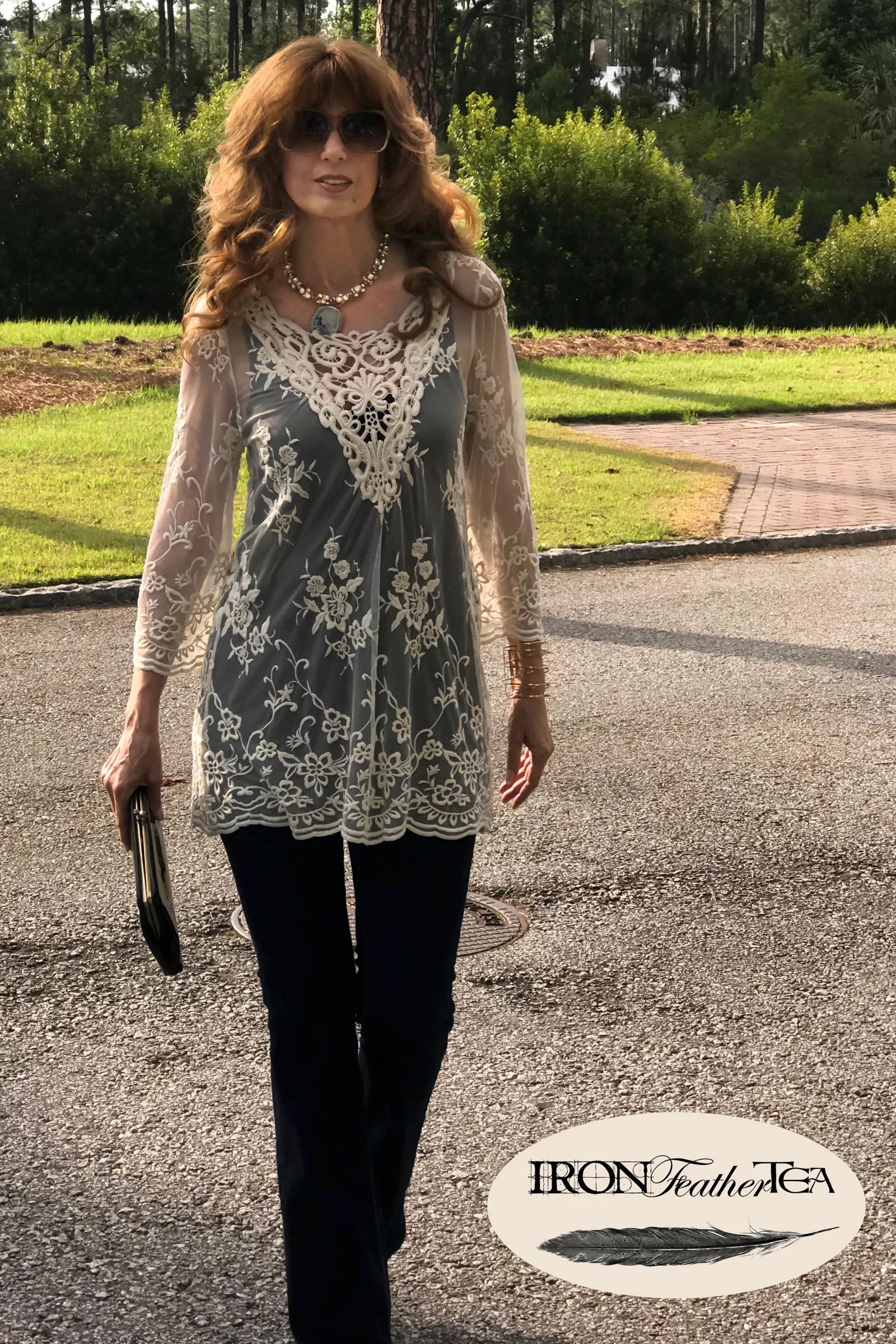 Delicate lace over a black tank top. 