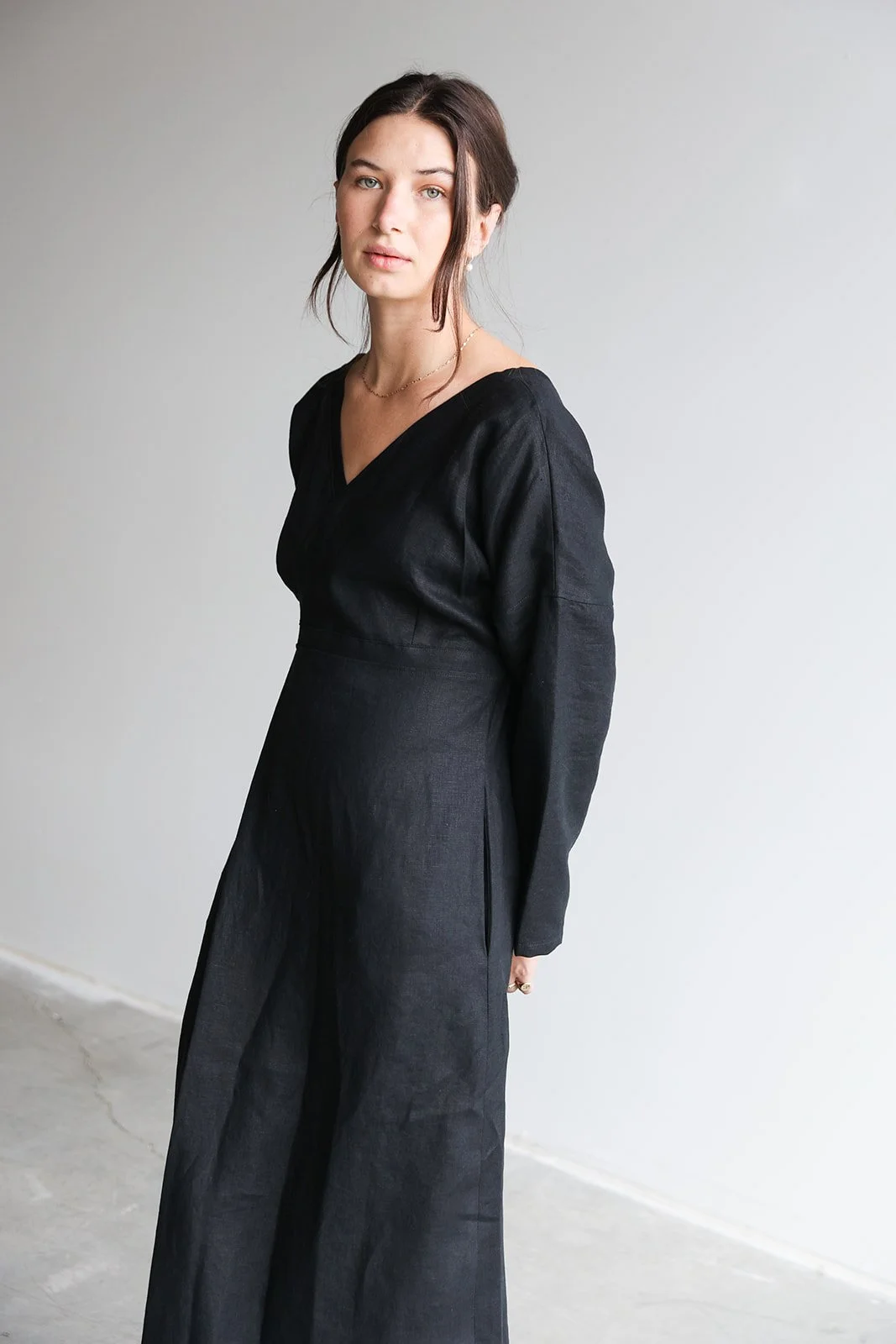 linen-dress-black-front-long-sleeves-pockets.jpg