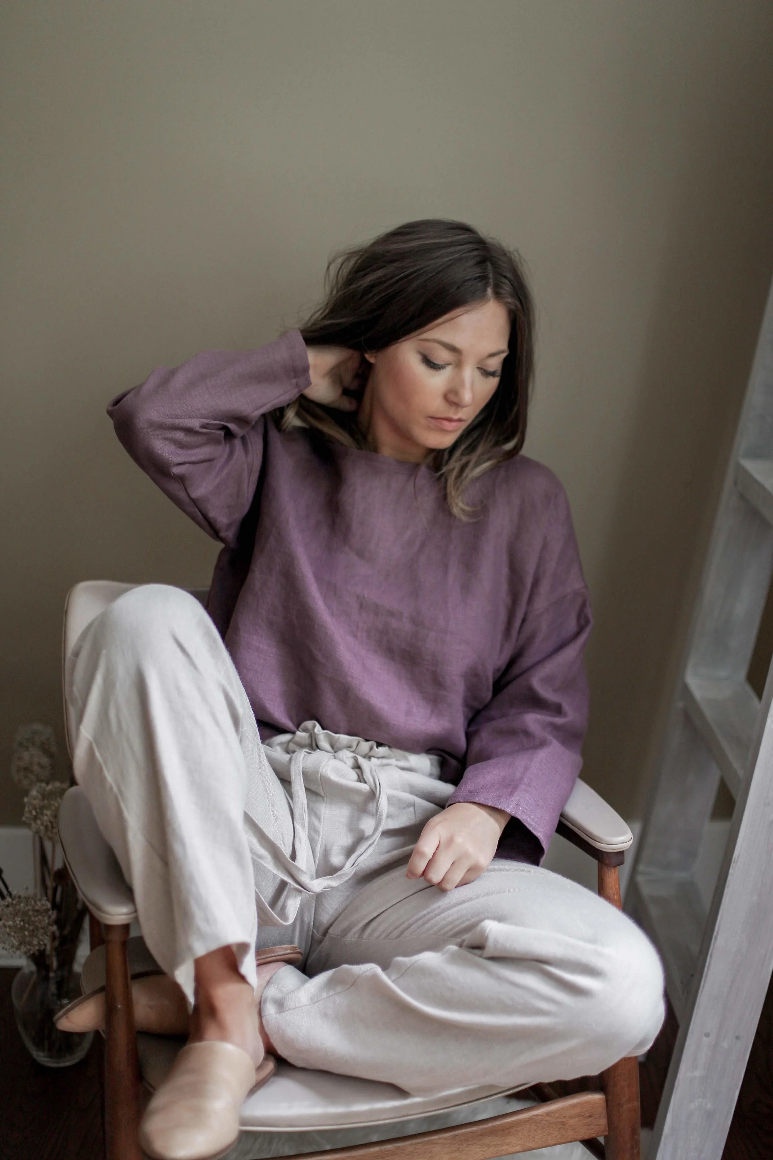 Handmade natural linen clothing by Nomi Designs in Victoria, BC | gleam colored linen pants with pockets and tie waist paired with long sleeve plum colored top