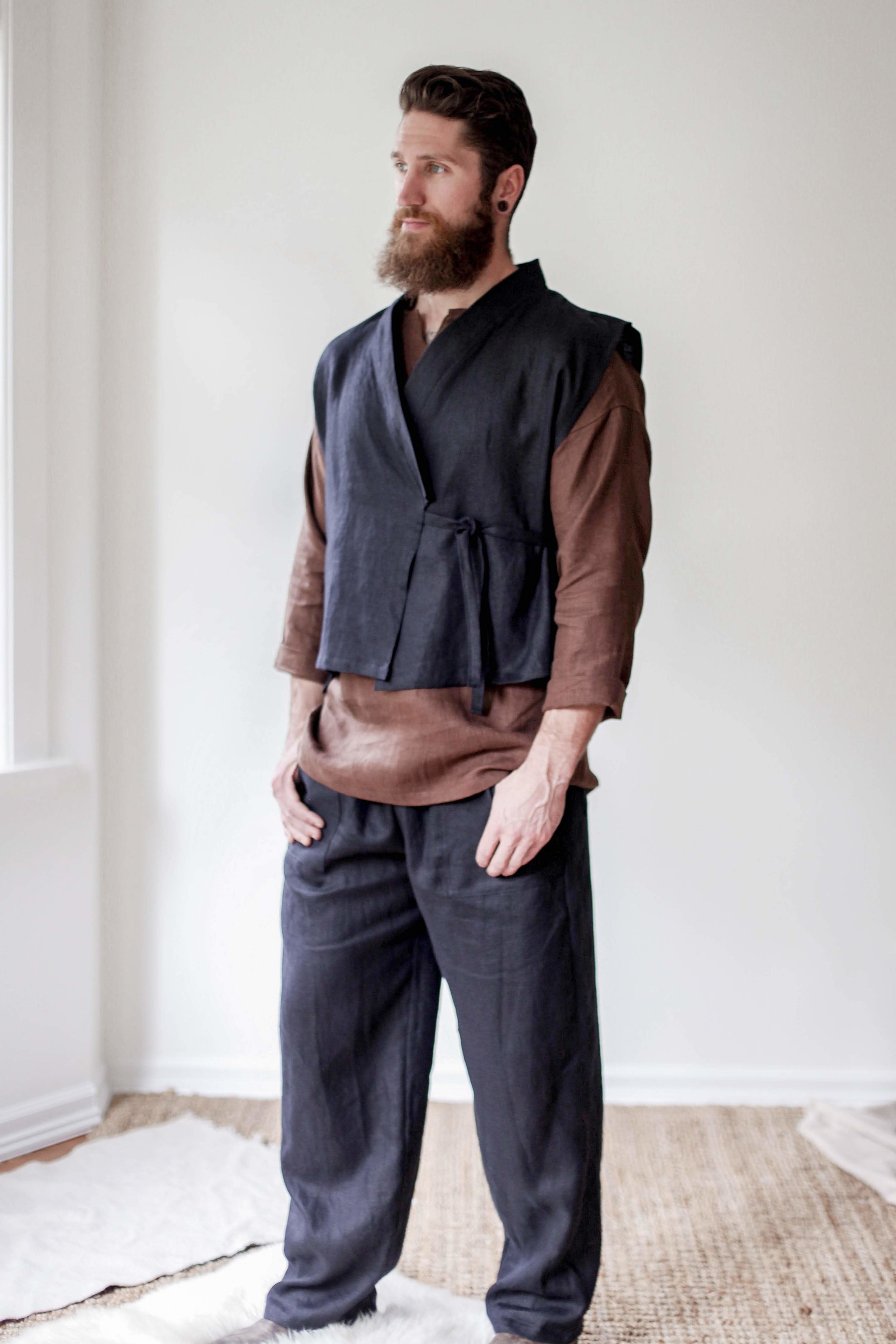 nomi-designs_mens-katara-vest_black_natural-linen-vest-for-men_front-paired-with-black-linen-pants.jpg