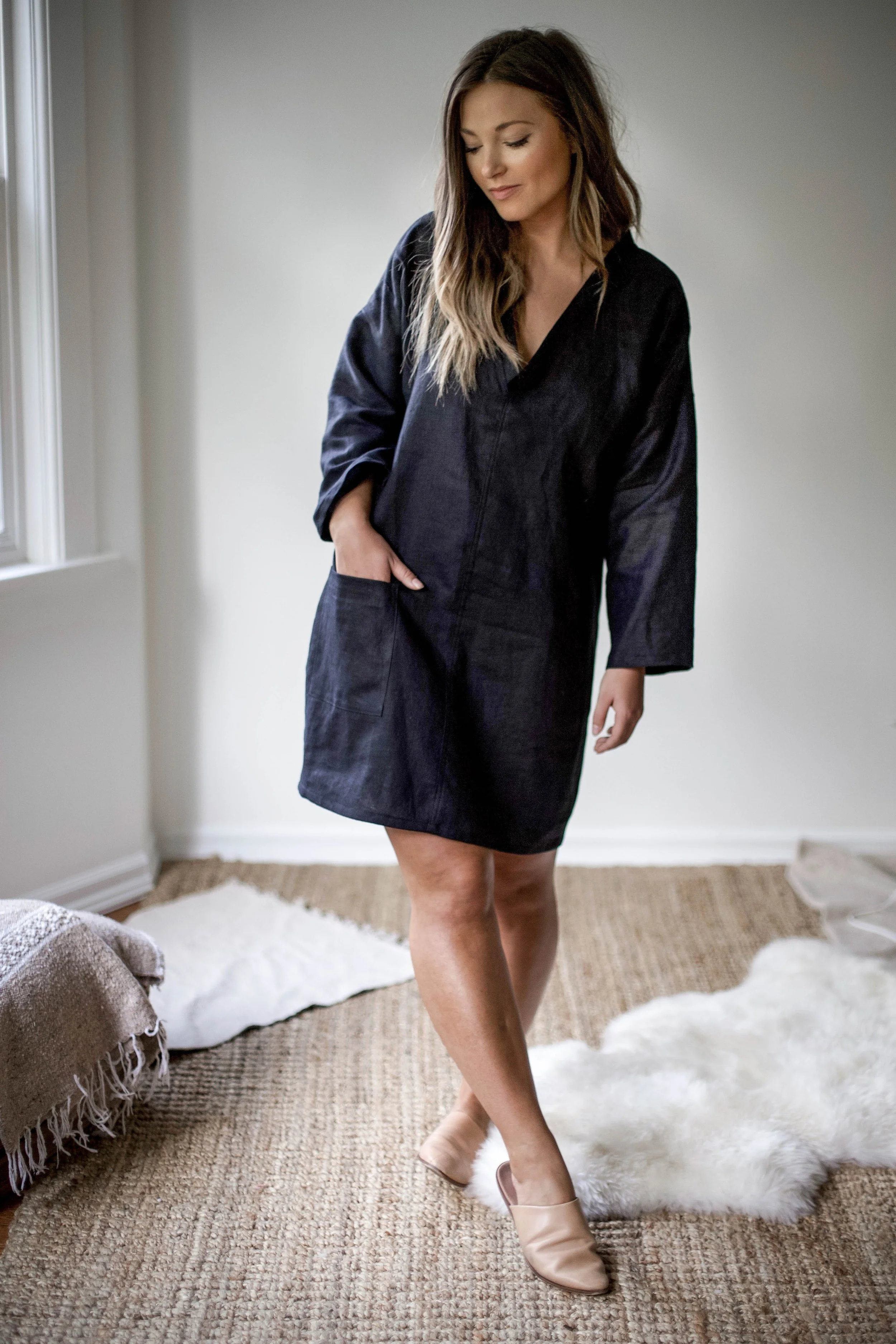 Handmade natural linen clothing by Nomi Designs in Victoria, BC | black linen long sleeve mid length dress - front