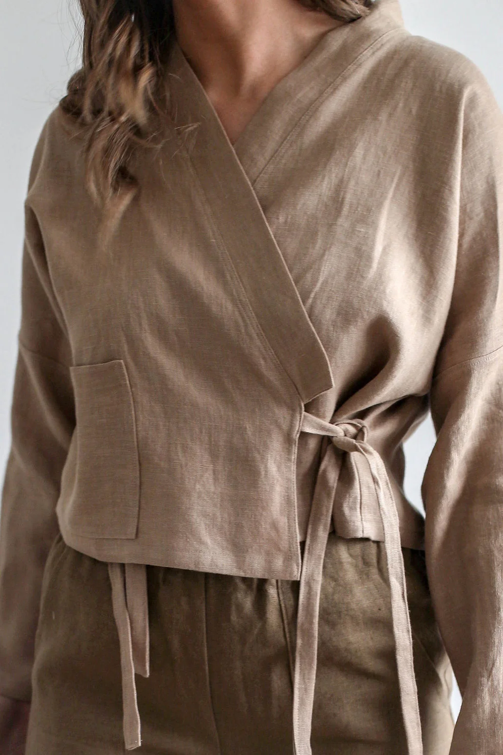 Linen Long sleeve wrap top with tie to the side in Camel color | Nomi Designs.jpg