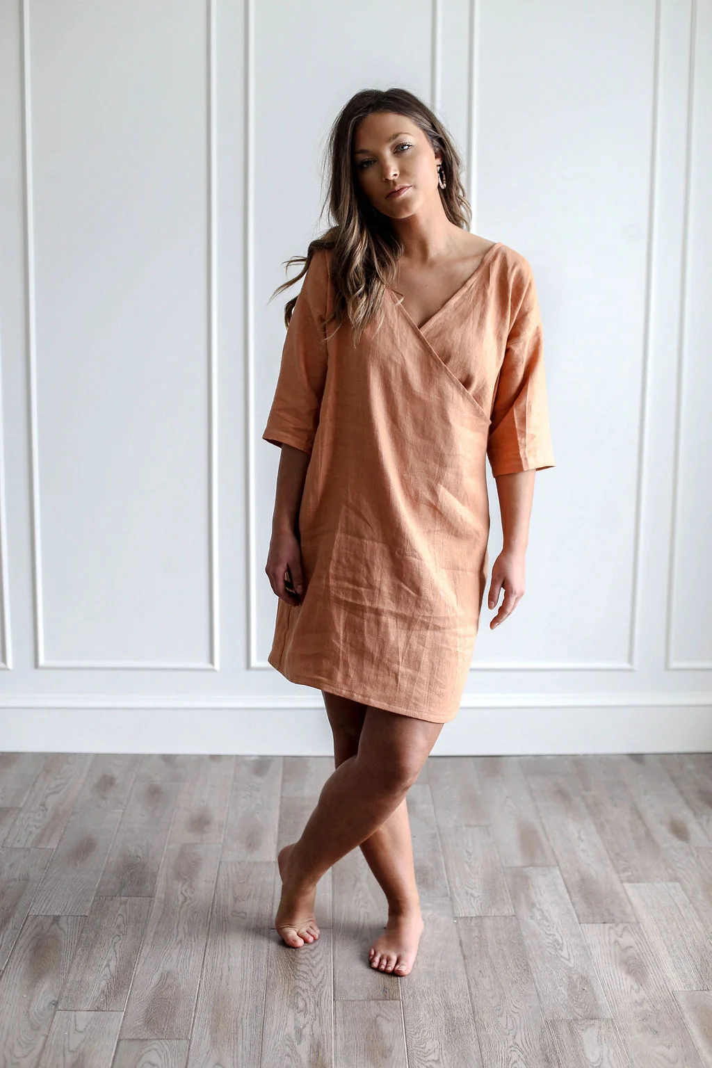 Handmade natural linen clothing by Nomi Designs in Victoria, BC | peach linen 3/4 sleeve mid length dress tunic - front