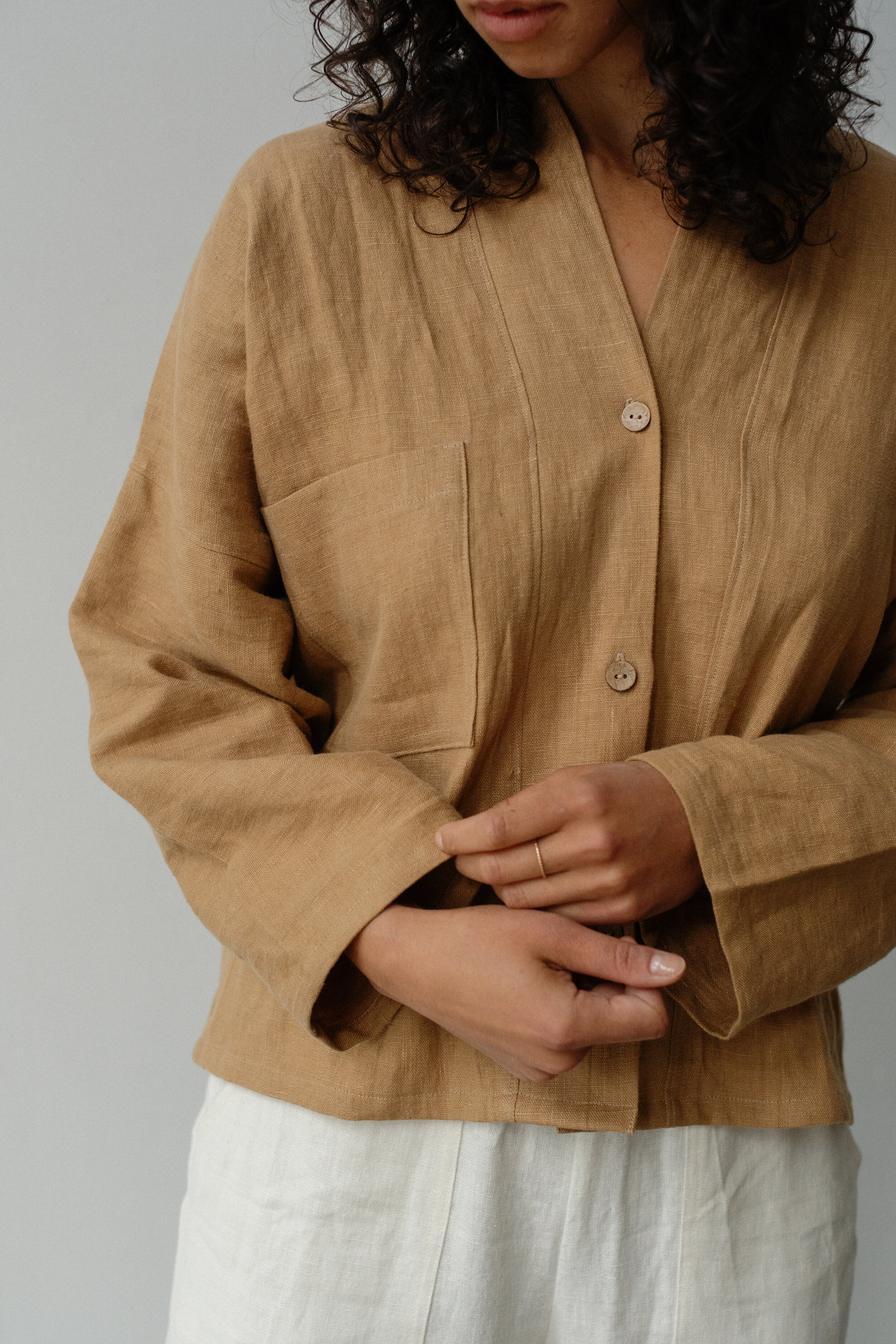 linen-women-shirt-camel-side-closeup-sleeve.jpg