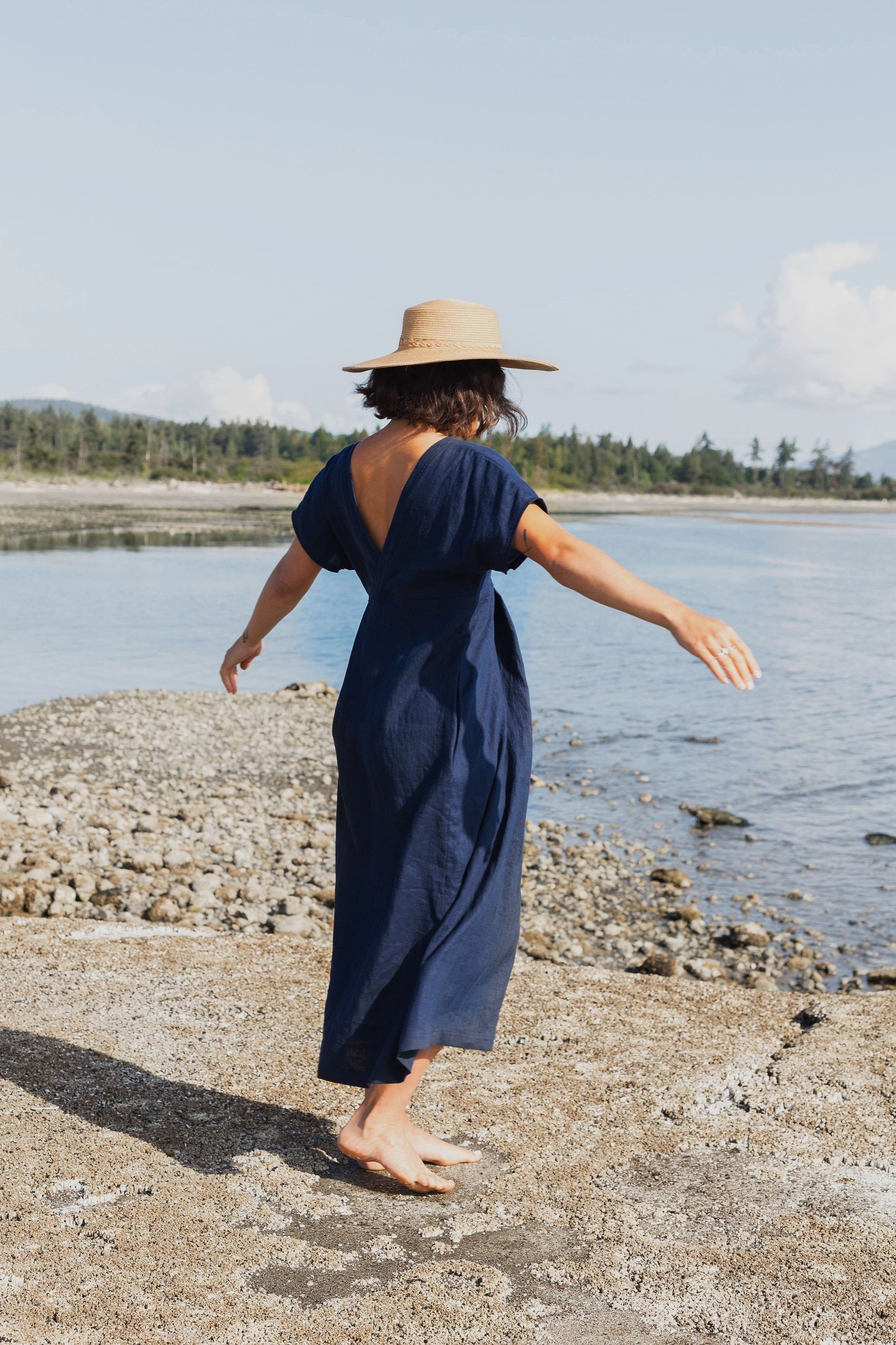 Woman wearing blue short sleeve linen maxi dress