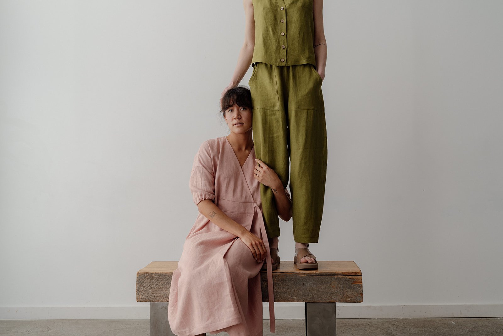 linen-dress-pink-sitting-vest-pants-pest-standing-front.jpg