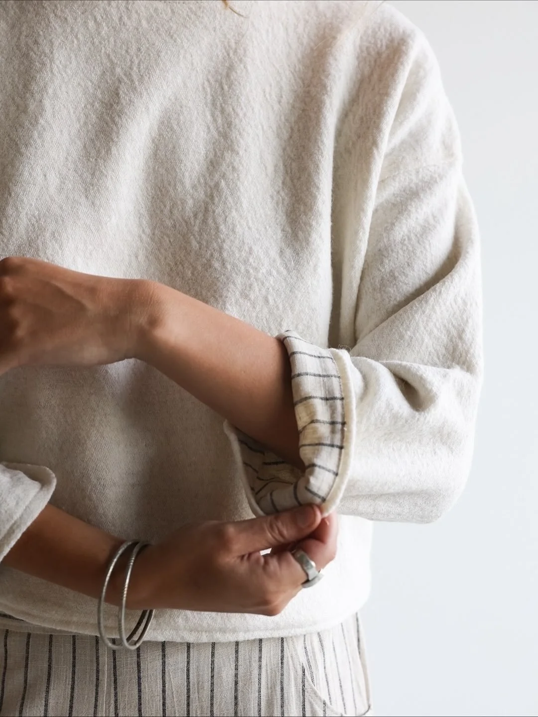 Stripes and Vanilla.
I love how the Sasha Sweater in Vanilla goes so well with the Eva Cargo Pants in Stripes, especially with the striped underlayer showing through the sweater.

@kenzie.owenn 
@berkleyvopnfjord 
@thefound.studio