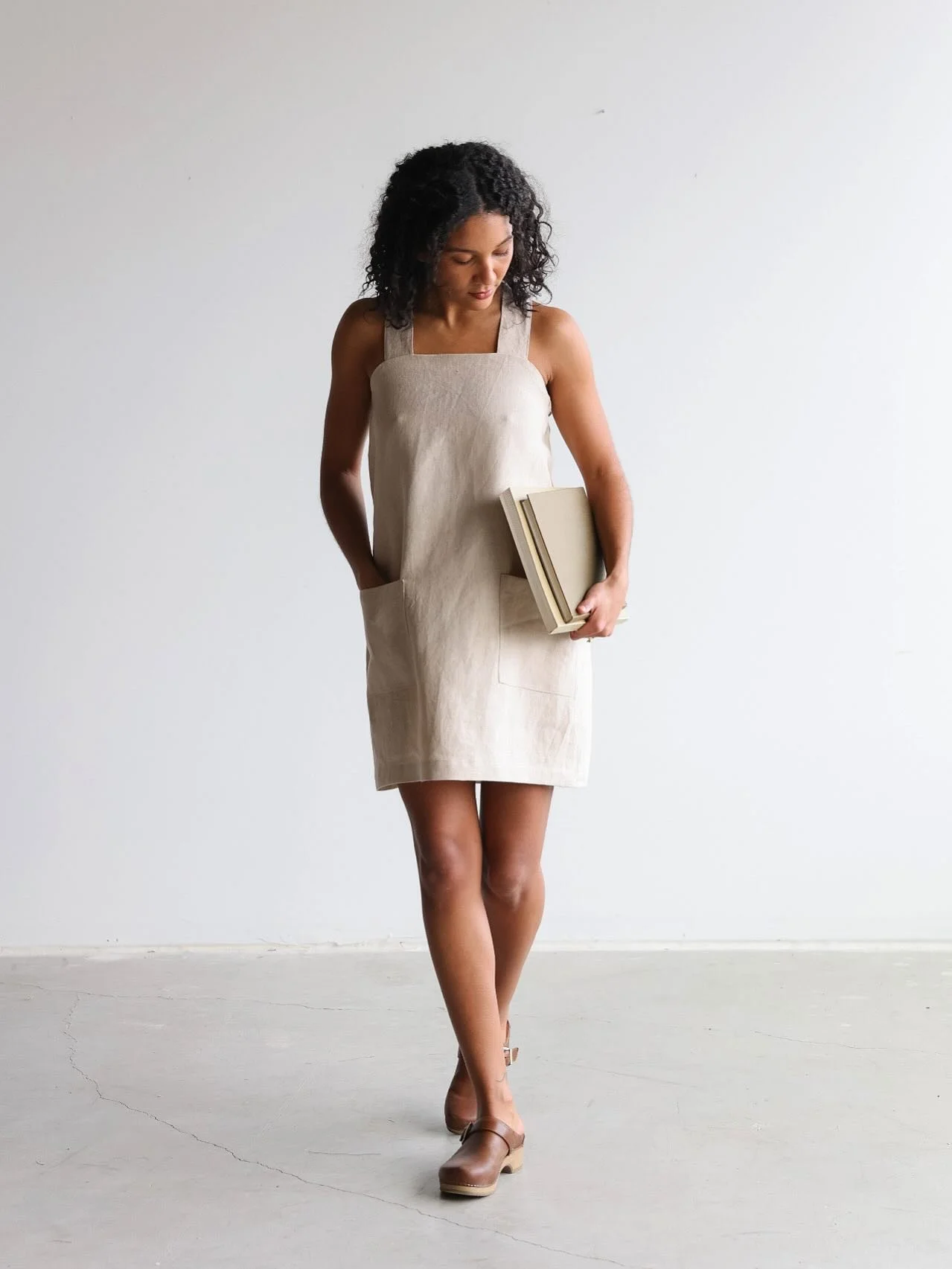 The Carmen Dress is back for the spring collection, with a few fresh updates.
The elastic now sits under the arms for a more natural shape without feeling tight. 
The straps are longer with back buttons and three adjustable lengths, so you can wear t