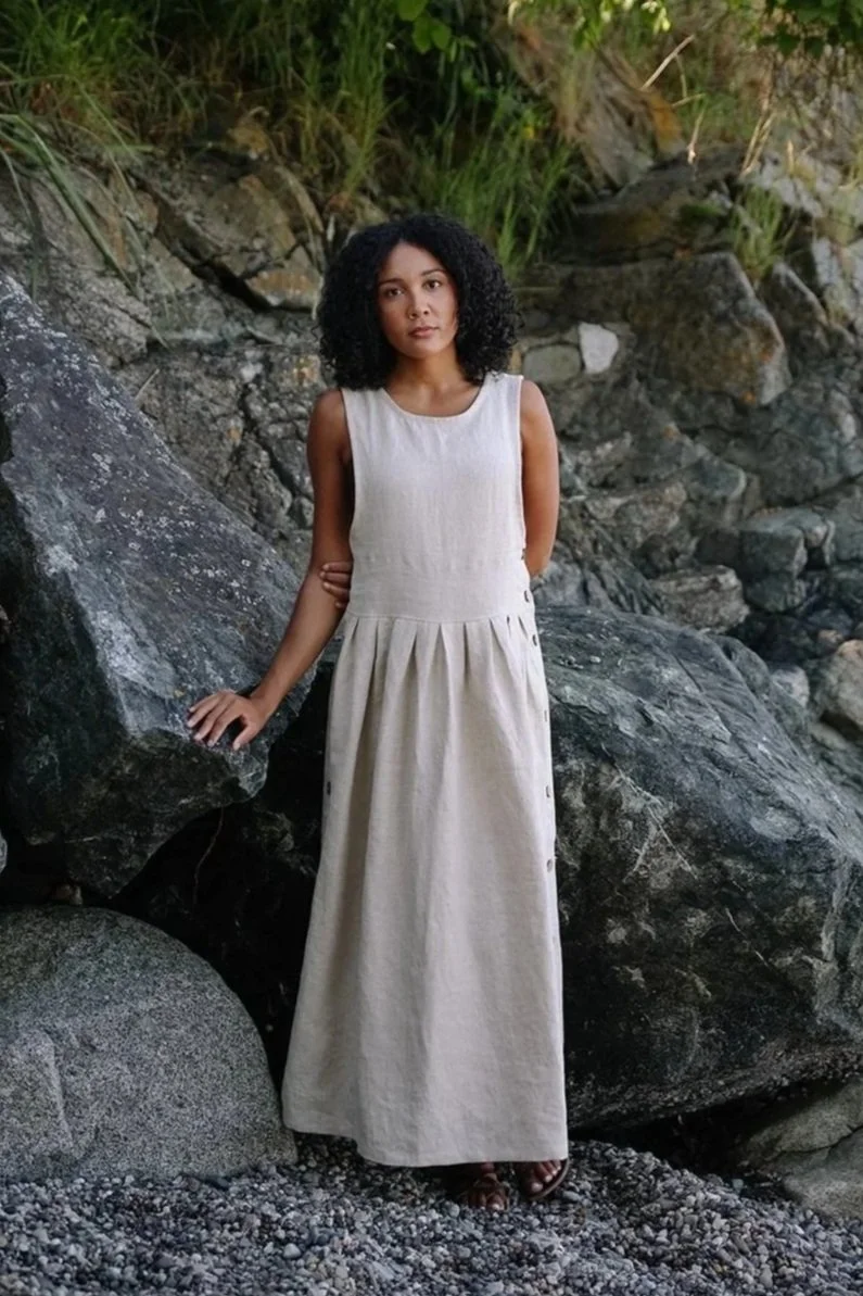 nomi-designs-linen-dresss-natural-front-rock-Beach.jpg