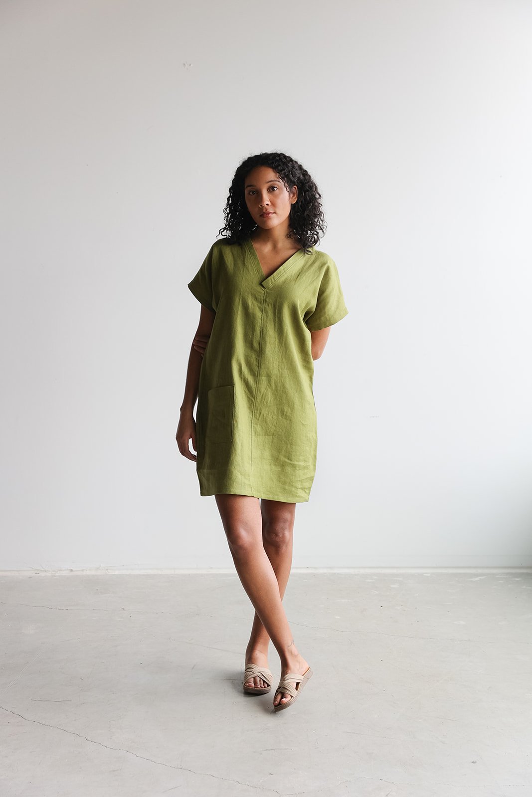 nomi-designs-linen-mini-dress-pesto-front.jpg